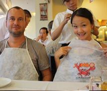 Eating chili crab can be slightly messy, which is why diners are outfitted with bibs before their meal begins at Jumbo Seafood. // © 2011 Deanna Ting